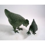 Two patinated metal chickens, largest 21cm long