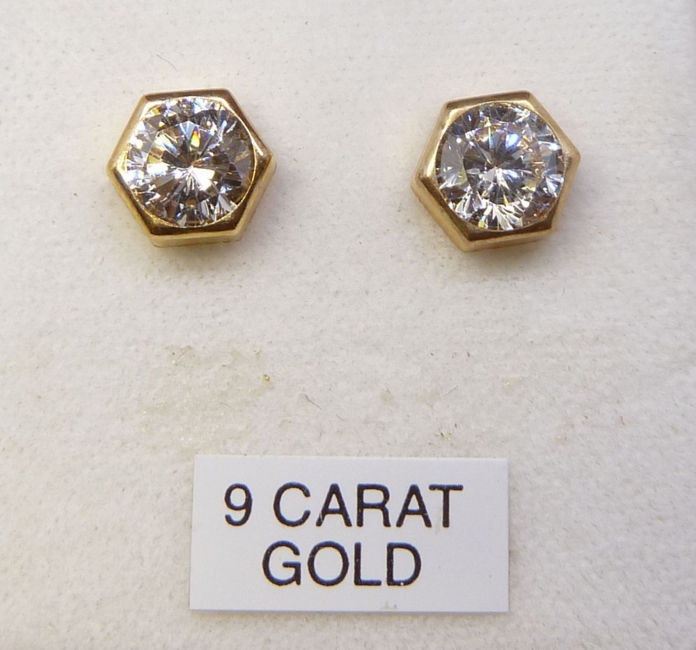 A pair of 9 carat gold hexagonal earrings