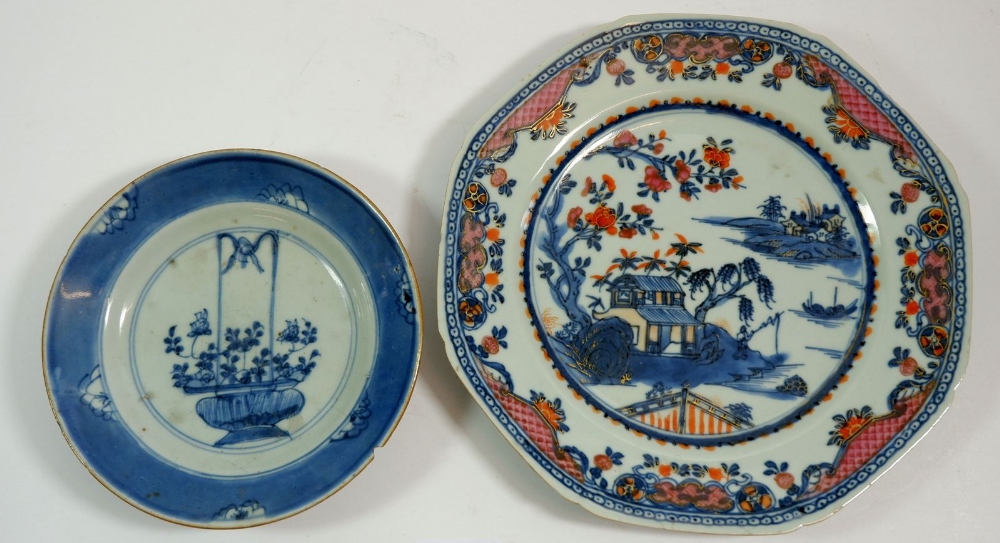 A Chinese Qian Long polychrome octagonal plate painted landscape, 23 cm diameter, and a Kang Xi blue