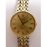 A Rolex 18 carat gold ladies wrist watch on 18 carat gold two tone strap, with Swiss hallmarks