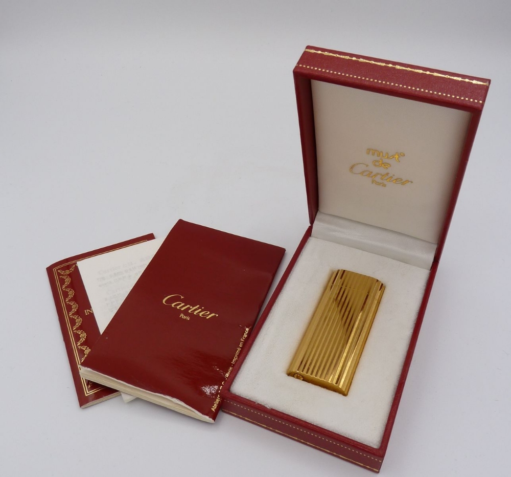 A gold plated Cartier cigarette lighter, boxed - Bild 3 aus 3