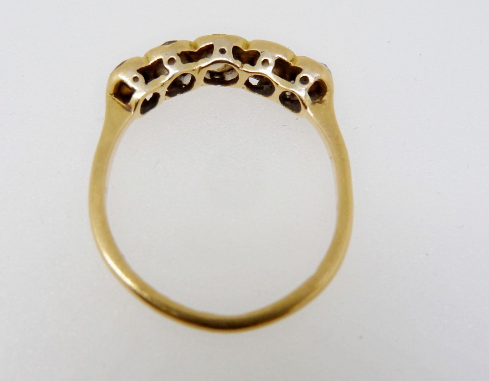 An Edwardian 18 carat gold ring set five diamonds, size J - Image 4 of 4