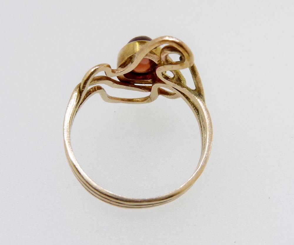 A 9 carat gold ring with asymmetrical set cabochon cut orange stone, size I, 2.1g - Image 4 of 4