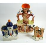 A Victorian Staffordshire small castle form pastille burner, a Staffordshire cottage and a