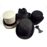 A top hat, two bowler hats and a trilby