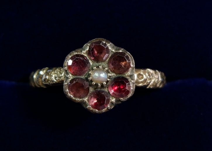 A Victorian yellow metal ring of flower form set amethyst and seed pearl, the shank with floral cast - Image 2 of 5