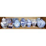 A collection of Chinese porcelain boxes, ginger jars, vases and a teapot