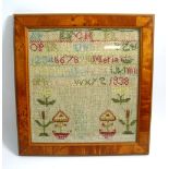 An early Victorian alphabet wool sampler by Maria Roberts, 1838, 23 x 24.5cm