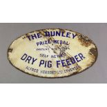 An oval antique enamel sign 'The Dunley Dry Pig Feeder' 13 x 20cm