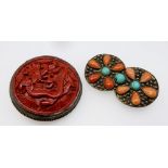 A Chinese red lacquer carved brooch and a coral and turquoise brooch, 4.5cm long