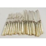 Ten silver plated and mother of pearl dessert knives and forks
