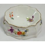 A Meissen floral painted trencher salt, crossed swords mark to base, 9 x 7.5cm