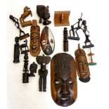 A box of African carved treen and tribal items