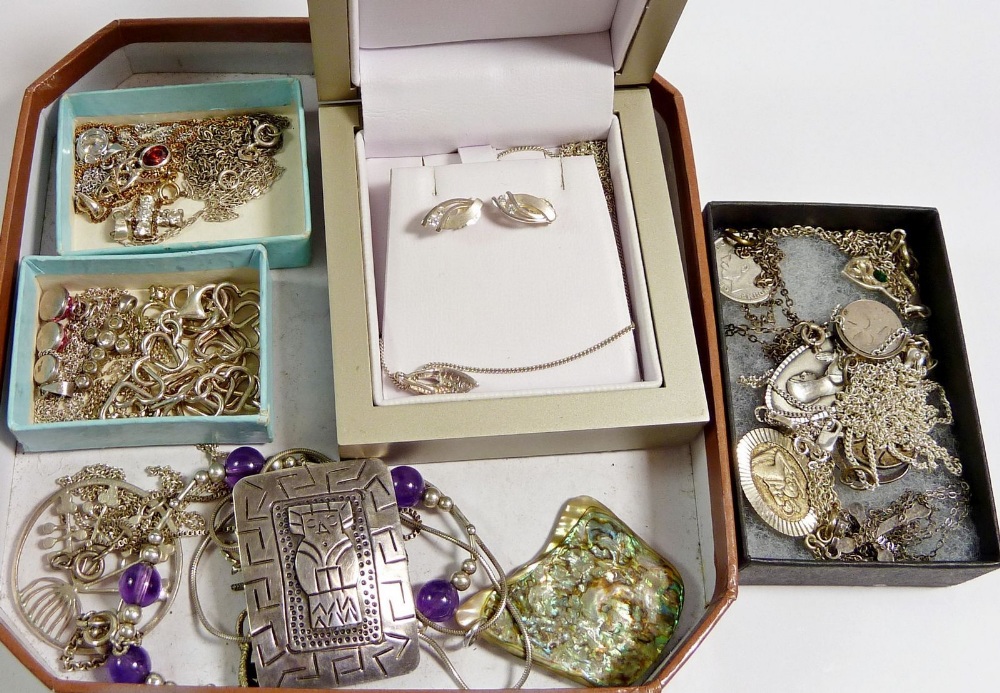 A box of assorted silver jewellery