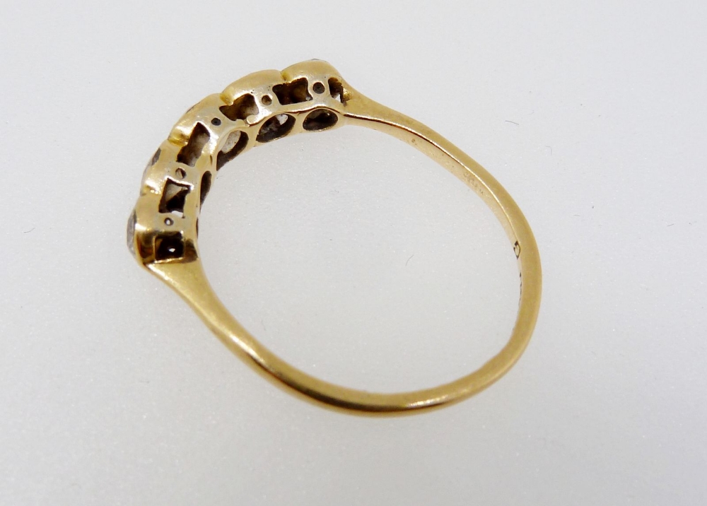 An Edwardian 18 carat gold ring set five diamonds, size J - Image 3 of 4