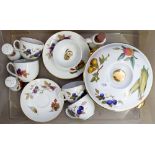 A Royal Worcester Evesham group including: tureen, four cups and saucers, five tea plates, salt,