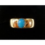 An 18 carat gold wide band ring set turquoise, 3.5g, size I