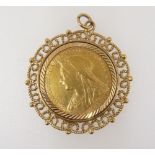 A gold sovereign 1893 in 9 carat gold mount