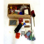 A box of magician's equipment including books and manuels