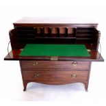 A 19th mahogany secretaire chest of two short and three long drawers with fitted interior and all
