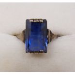 A 9 carat gold Art Deco ring set rectangular blue stone, size K