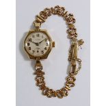 A 9ct gold Rotary ladies wrist watch and strap
