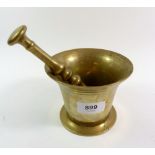 A brass pestel and mortar, 9cm