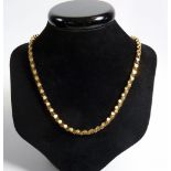 An 18 carat gold faceted necklace 19g