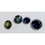Four various cut semi-precious stones