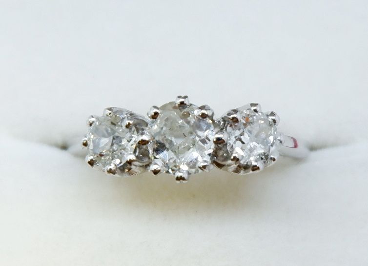 A platinum three stone diamond ring, size P to O, total diamond weight 1.32 carats - Image 2 of 5