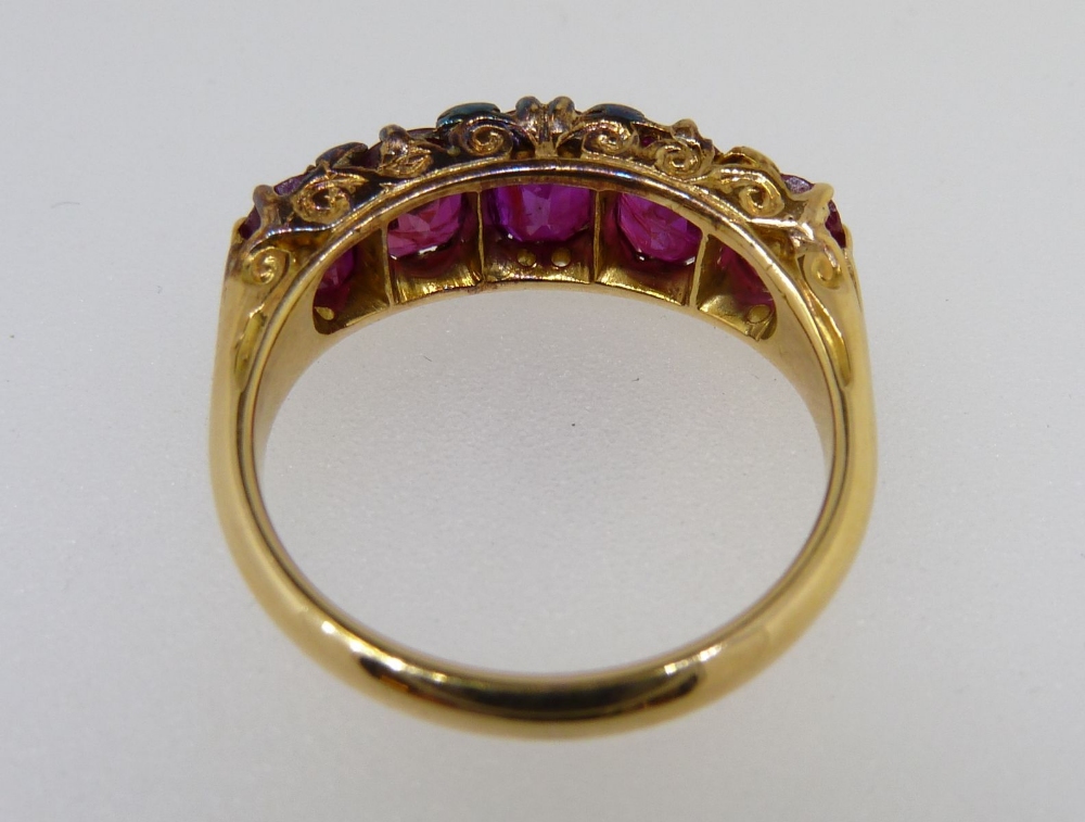 A Victorian gold ring set five graduated rubies interspersed with chip diamonds, size M, 5gm, - Image 4 of 4