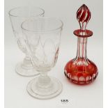 A Victorian red overlaid glass scent bottle and two hand blown wine goblets