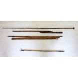 Two Victorian fishing rods, a bamboo rod stand and various part rods