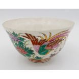 A Chinese enamel famille rose tea bowl painted exotic birds and flowers, 9.5cm diameter