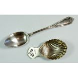 A silver shell form caddy spoon Birmingham 1967 and a continental silver spoon, boxed