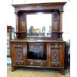 An Edwardian Art Nouveau mahogany mirror back sideboard with carved decoration on reeded columns,