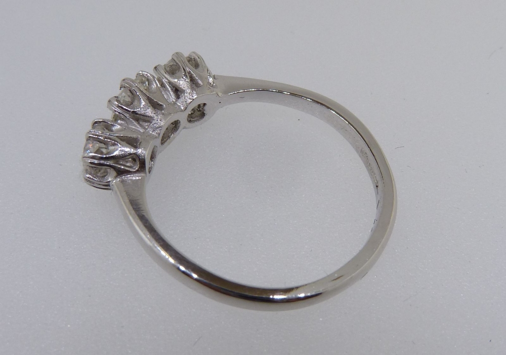 A platinum three stone diamond ring, size P to O, total diamond weight 1.32 carats - Image 3 of 5