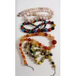 Four various stone bead necklaces with silver clasps