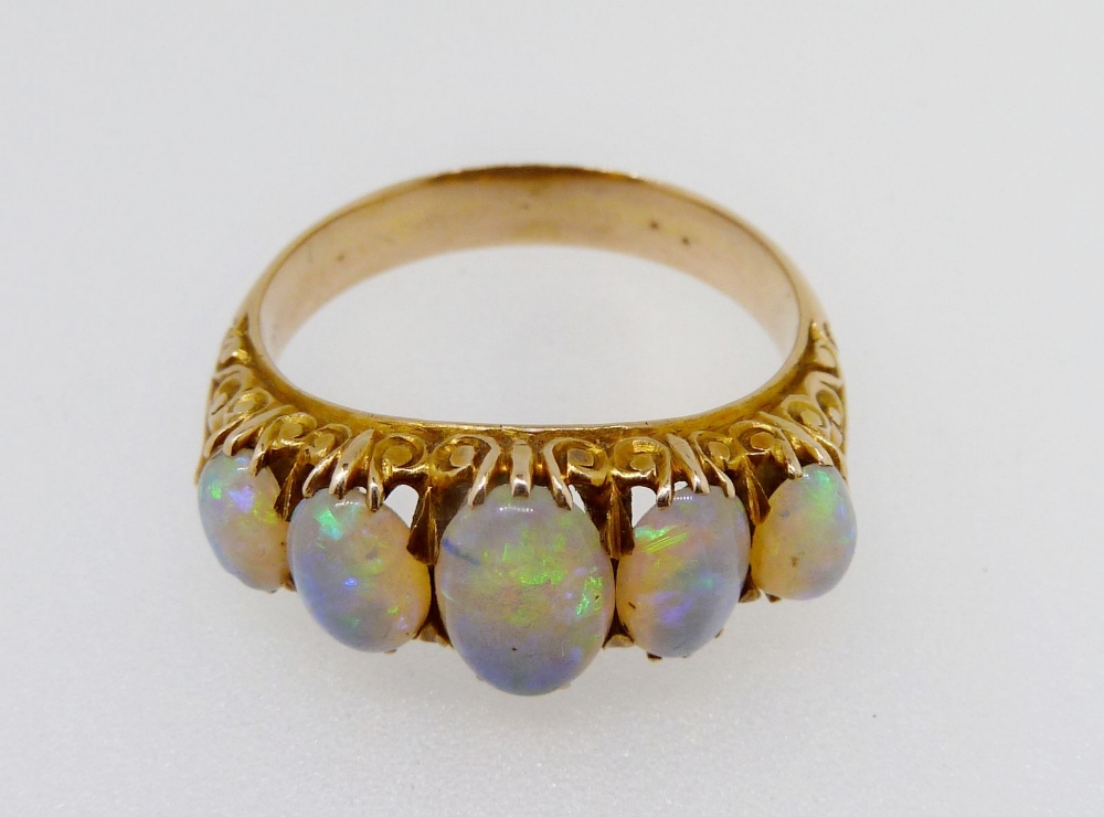 An 18 carat gold five stone opal ring, size O, 5.2g, unmarked - Image 3 of 5