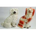 Two Victorian Staffordshire dogs, largest 23cm
