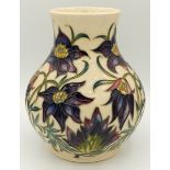 A Moorcroft vase by Philip Gibson, trial piece with purple flowers, 16cm, 1999