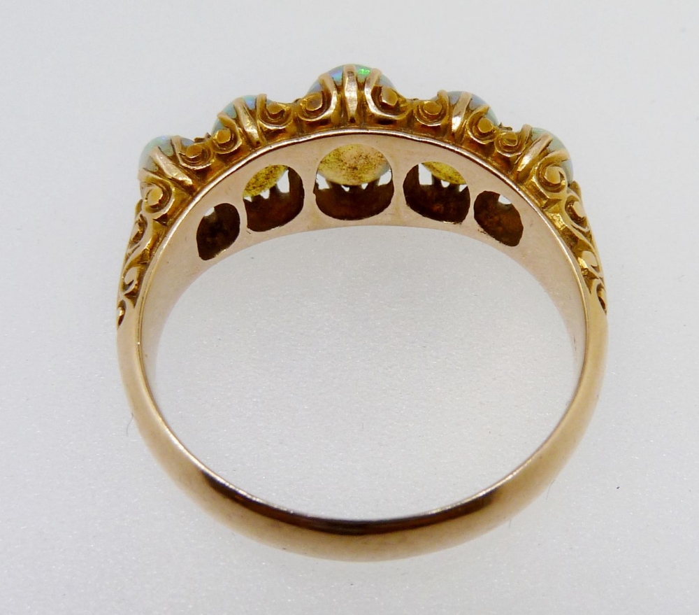 An 18 carat gold five stone opal ring, size O, 5.2g, unmarked - Image 5 of 5