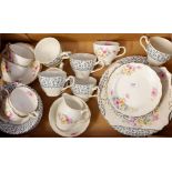 A vintage Tuscan floral tea set comprising six cups and saucers, six tea plates, one small serving