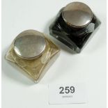 A pair of glass and silver plated inkwells, 4.5cm square, 3.5cm tall - to fit a writing slope