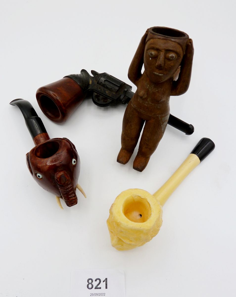A group of four novelty pipes including elephant, pistol etc.