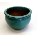 A large turquoise green garden pot, 32 x 52cm