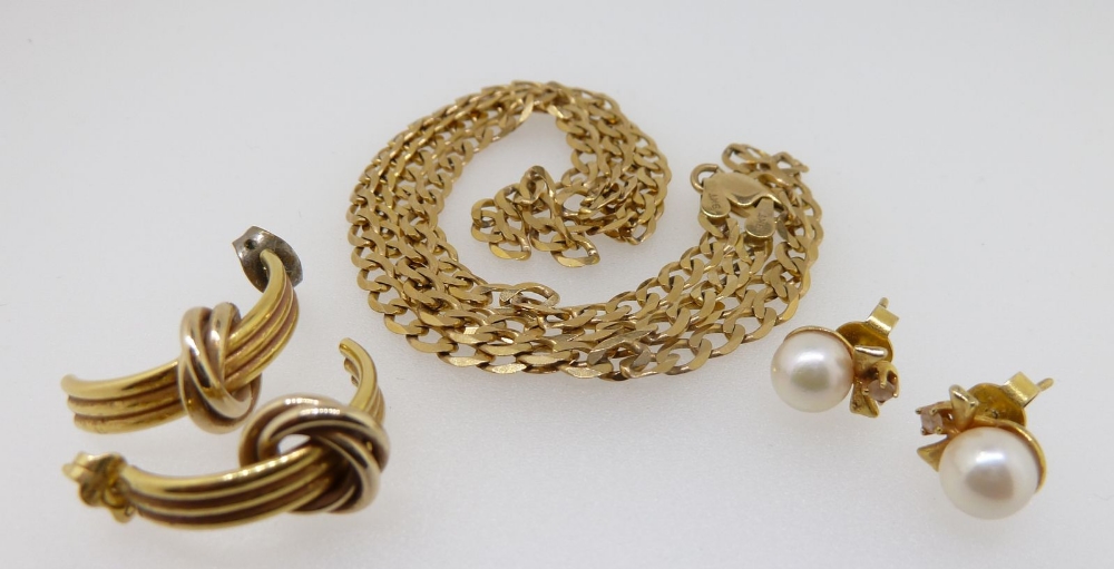 A 9 carat gold chain, 8.3g and two pairs of 9 carat gold earrings 5.4g total weight including pearls