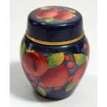 A Moorcroft enamel miniature ginger jar and cover painted pomegranates on a blue ground, 7cm