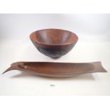 A carved wood fruit bowl and a long wooden bread holder, signed Montyfod, 53cm