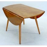 An Ercol light elm dropleaf dining table, 112cm long